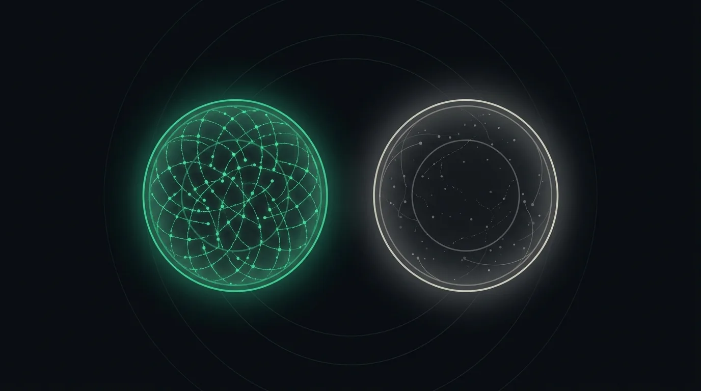 Two equal-sized red cells, one with densely packed emerald pigment and one sparse.